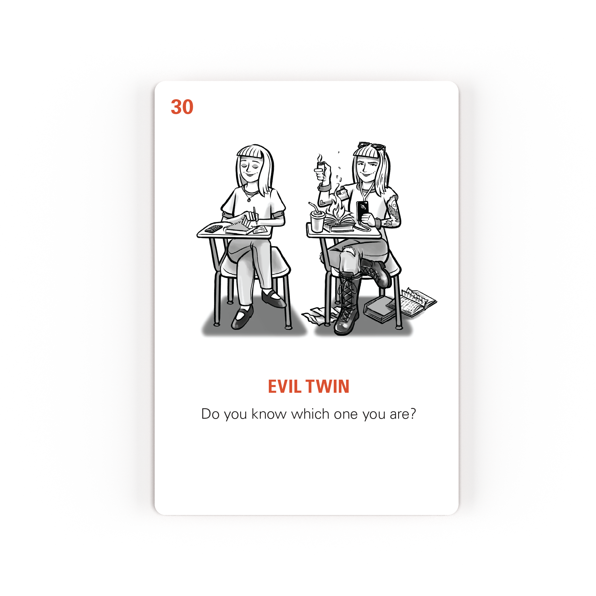 Illustration of the Evil Twin card from Writer Emergency Pack, with two young Sitting at school desks the one on the left is prim and proper while the one on the right is dressed rebelliously and lighting a lighter. Text below reads: Evil twin; Do you know which one you are?