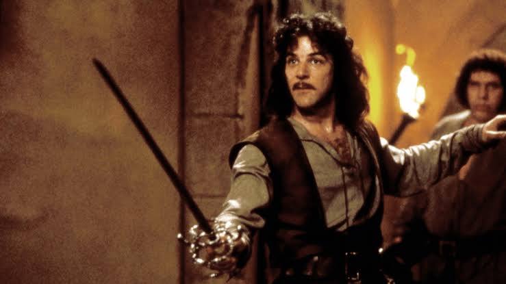 Inigo Montoya holds out a sword, ready to get vengeance on the man who killed his father.