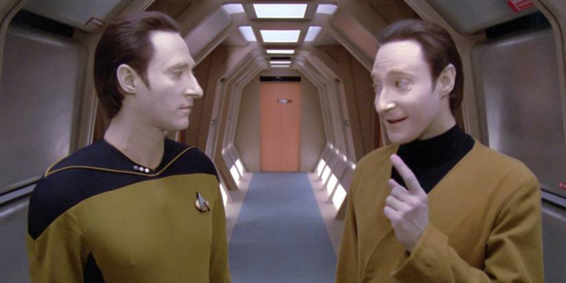 Data and Lore talking in one of the many generic hallways of the USS Enterprise-D. From Star Trek: The Next Generation