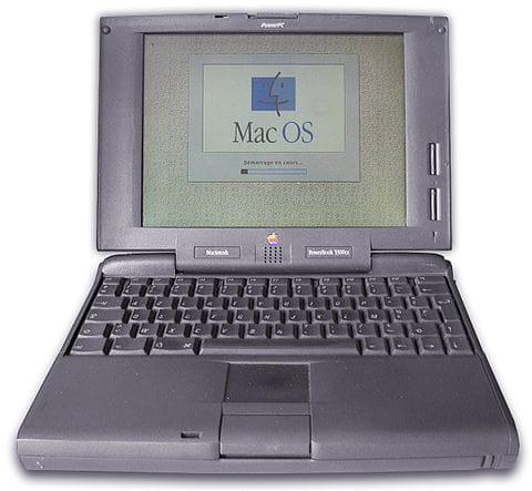 A picture of a Powerbook 5300 laptop booting up Mac OS.