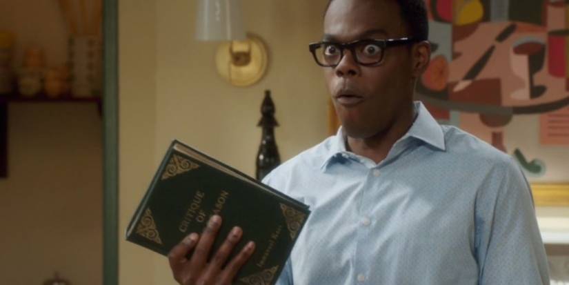 The Good Place: Chidi makes an excited face after holding out his hand and summoning a book like it's Mjolnir.