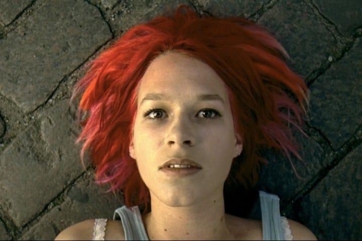 Run, Lola, Run: Lola, not running. Lying on the ground looking up at the camera, probably thinking "WTF, mate?"
