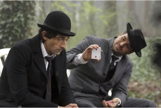 The Brothers Bloom: Stephen holds up a two of diamonds, asking Bloom if that's his card. Bloom ignores him.