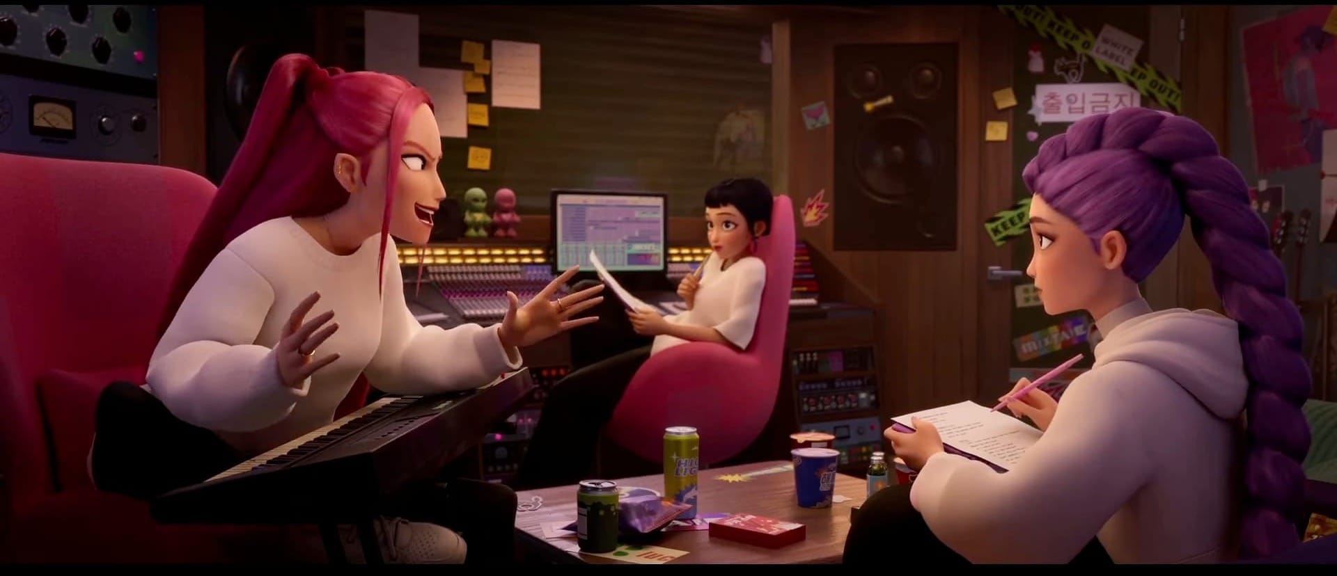 Kpop Demon Hunters: Mira, Rumi, and Zoey work on the lyrics to Takedown in a recording studio.