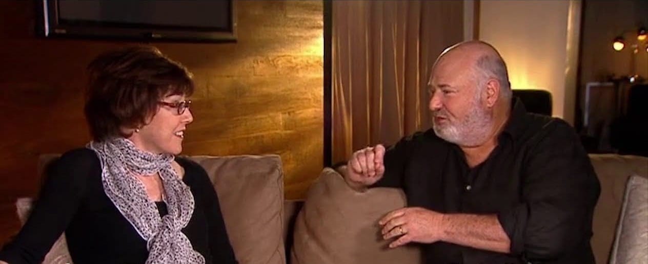 Nora Ephron and Rob Reiner sit on a couch for an interview about When Harry Met Sally...