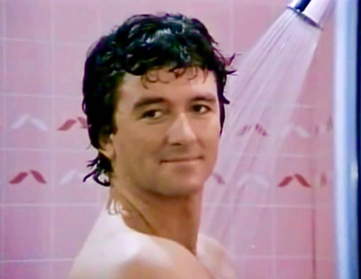 Dallas - Patrick Duffy turns around in the shower to look to camera, revealing that his character didn't actually die. Caption quote from the Notorious B.I.G. song, "Juicy."