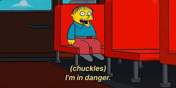 Ralph Wiggum sitting alone in the back of the school bus. Caption reads: (chuckles) I'm in danger.