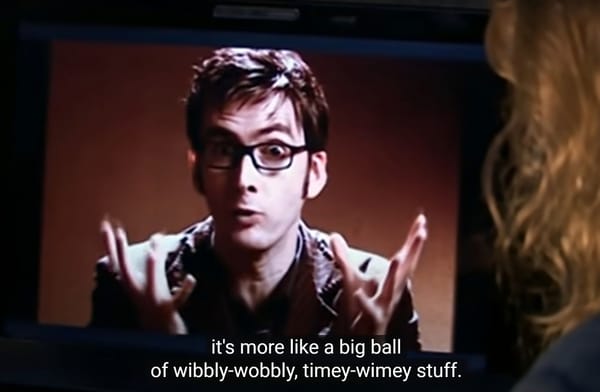 Doctor Who: David Tennant wearing his time-to-look-smart glasses and talking with his hands. Caption: It's more like a big ball of wobbly-wobbly, timey-wimey stuff.