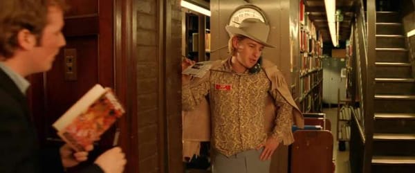 The Royal Tenenbaums: Eli Cash talks on a landline phone, resplendent in his retro cowboy garb. A fan approaches for an autograph.