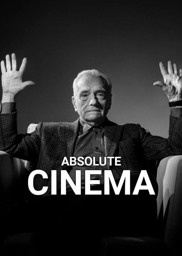 Martin Scorsese sits in an armchair, holding up his hands. The caption in front of him reads "Absolute Cinema"